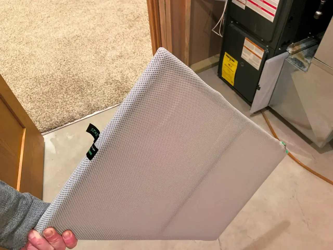 Reusable washable HVAC filter shown as a maintenance example